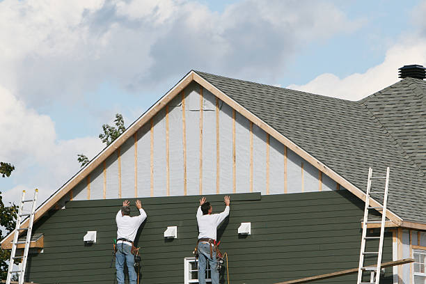 Professional Emergency Siding Repair technician working in Melrose Park, NY